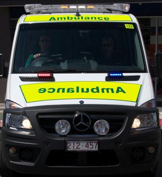 A photo of the fron of an ambulance