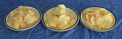 Photo of three bowls of potato chips