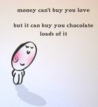 A card that reads: money can’t buy you love but it can buy you chocolate, loads of it