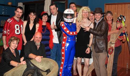 A group shot of myself and Claudia with friends on a poker night. The theme for the evening was fancy dress and those present have gone to some effort to dress as Fonzi, Indianna Jones and even Evel Knievel. I was the only cross-dresser.