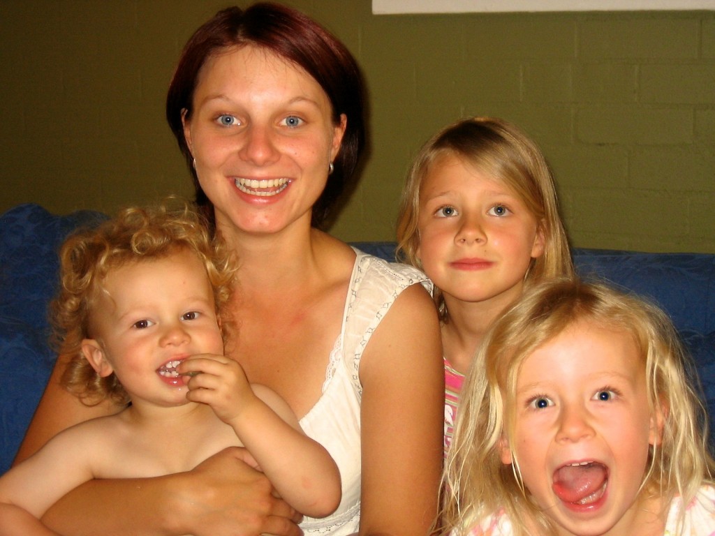 Claudia with 3 children she was au pair for.